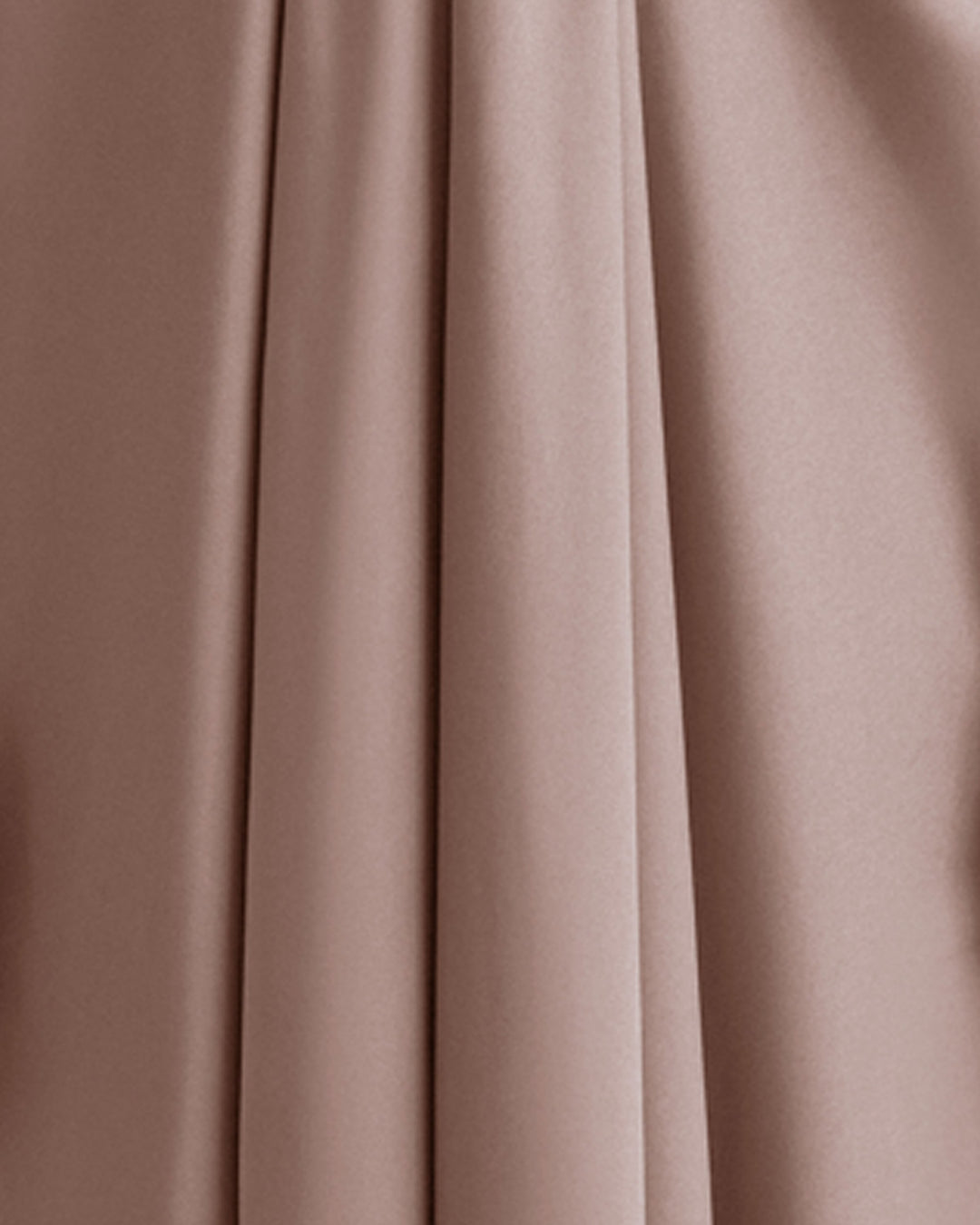 A close-up of a taupe color satin fabric.