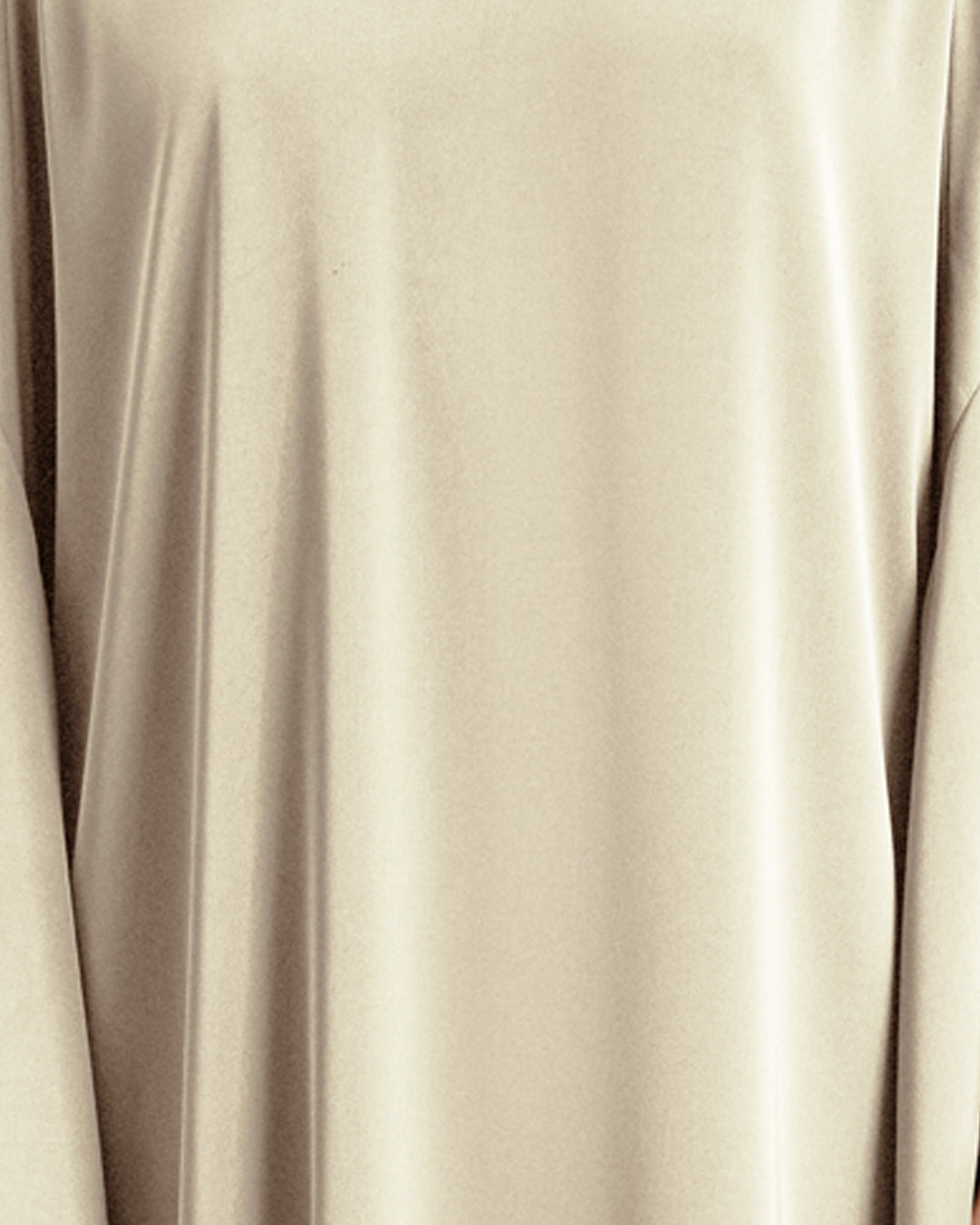 A close-up of a cream color satin fabric.