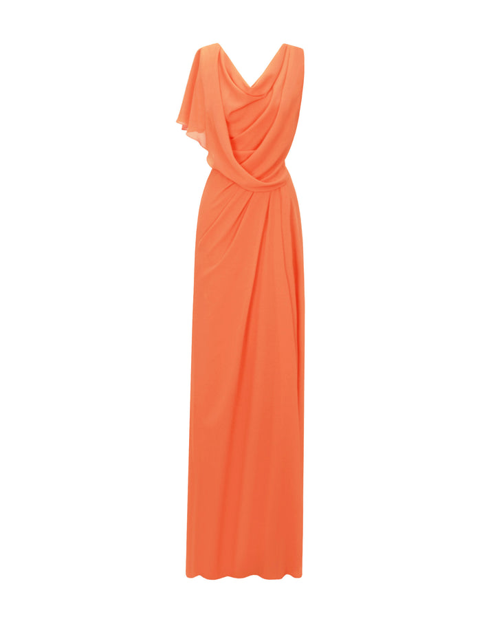 A draped long peach evening dress with asymmetrical sleeves, and a high slit on the side.