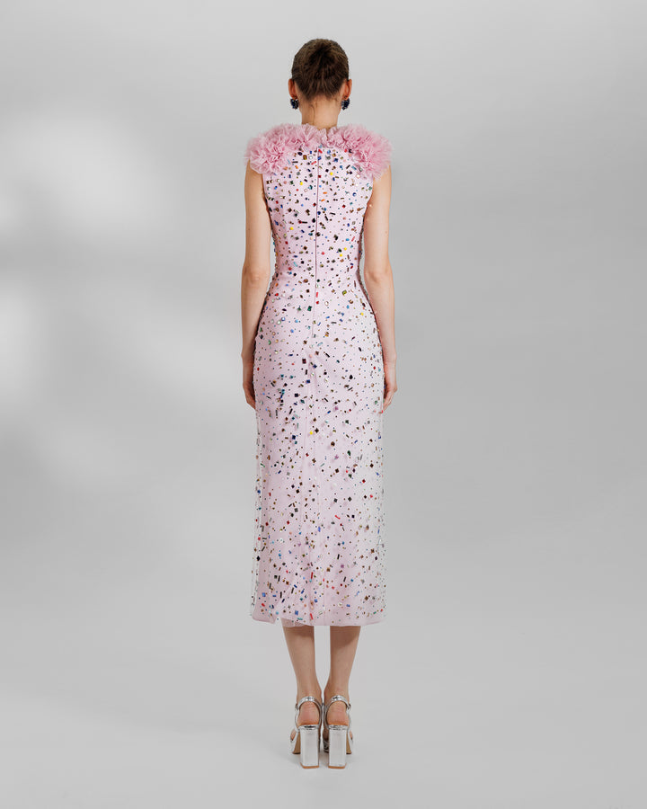 The back of a fully multicolor beaded pink midi dress featuring a V- Neckline with rushed organza detail.