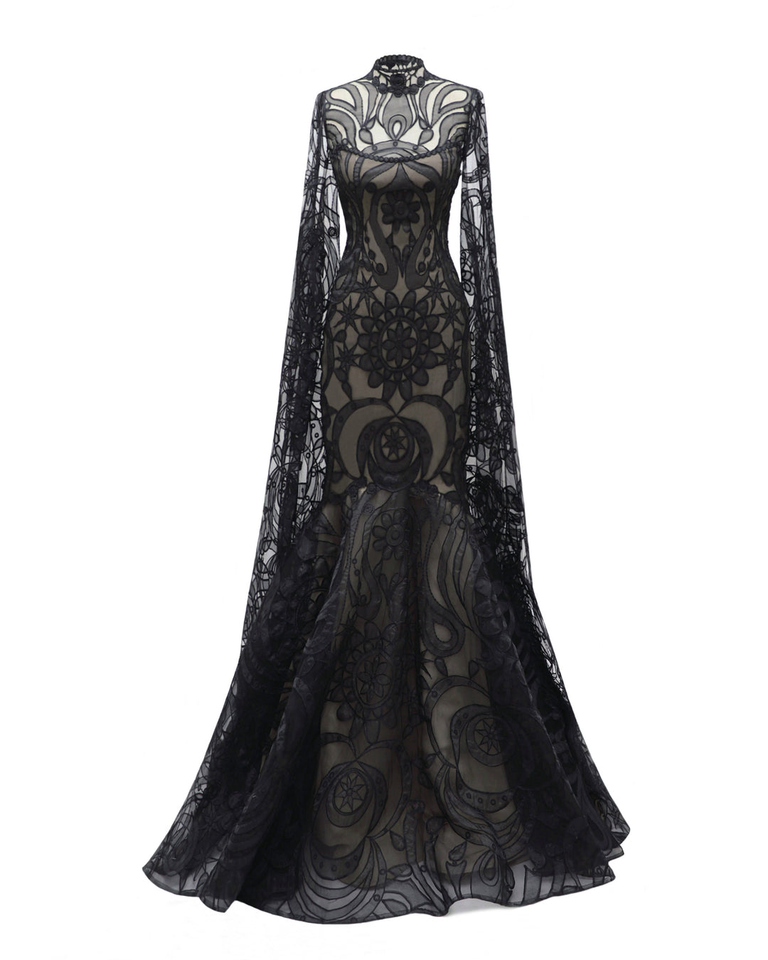 A strapless mermaid-cut black patterned lace evening dress with a flared tail, and a detachable top with floor length sleeves.