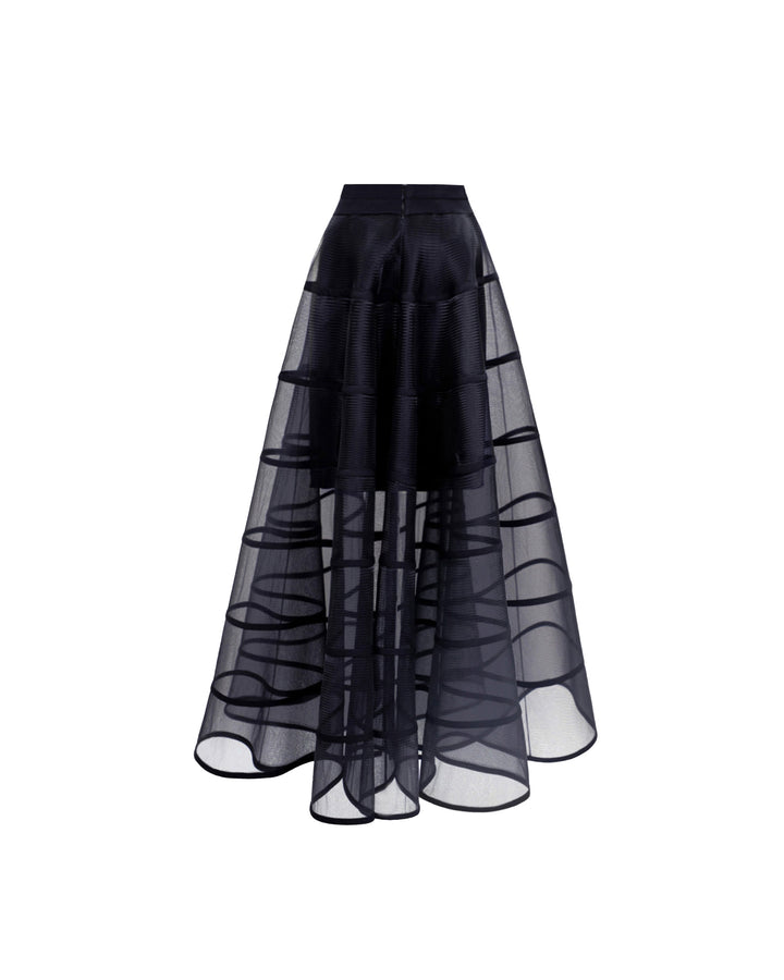 The back of a cage-like long black skirt.