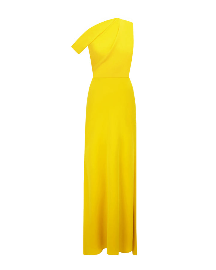 An asymmetrical cut crepe long yellow evening dress with draping details on the upper part and a slim cut skirt.