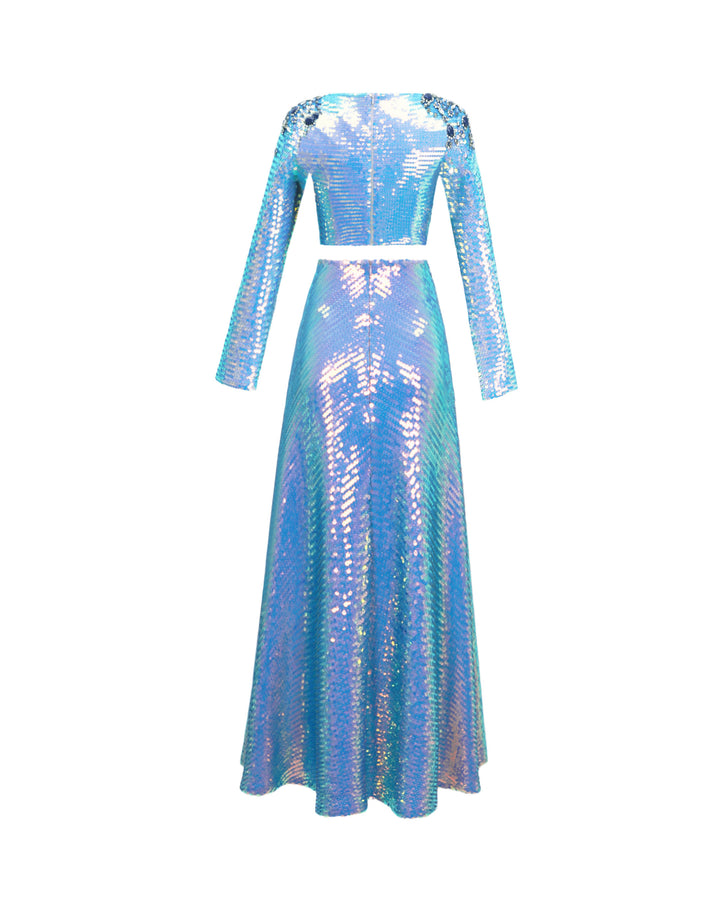 The back of a blue sequined evening wear set featuring a sleeved cropped-top with beaded shoulders paired with a flared midi skirt.