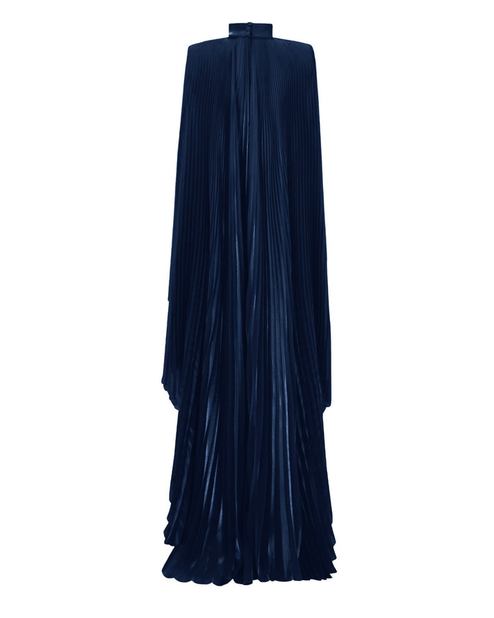 The back of a high neckline fully pleated flared navy organza dress with cape-like sleeves.