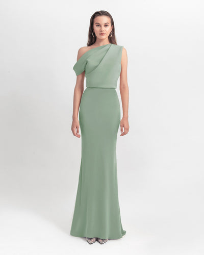 An asymmetrical cut crepe long mint green dress with draping details on the upper part and a slim cut skirt.