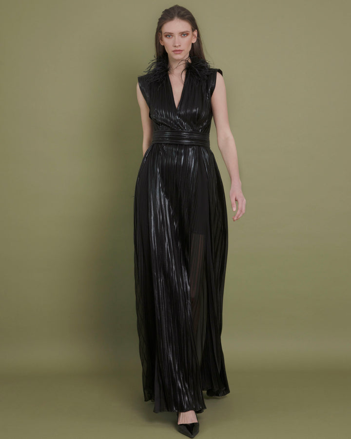 A V-cut neckline fully pleated black evening dress with feather details on the neck and a pleated chiffon side slit.