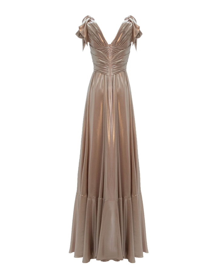 The back of a draped upper part flared cut, laminated pink chiffon long dress with bow-design details on the shoulders.