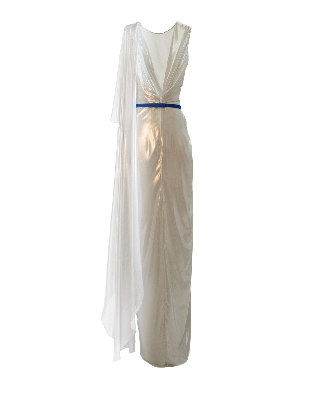 The back of an asymmetrical silver laminated pleated dress featuring an open back and a contrasting blue belt.