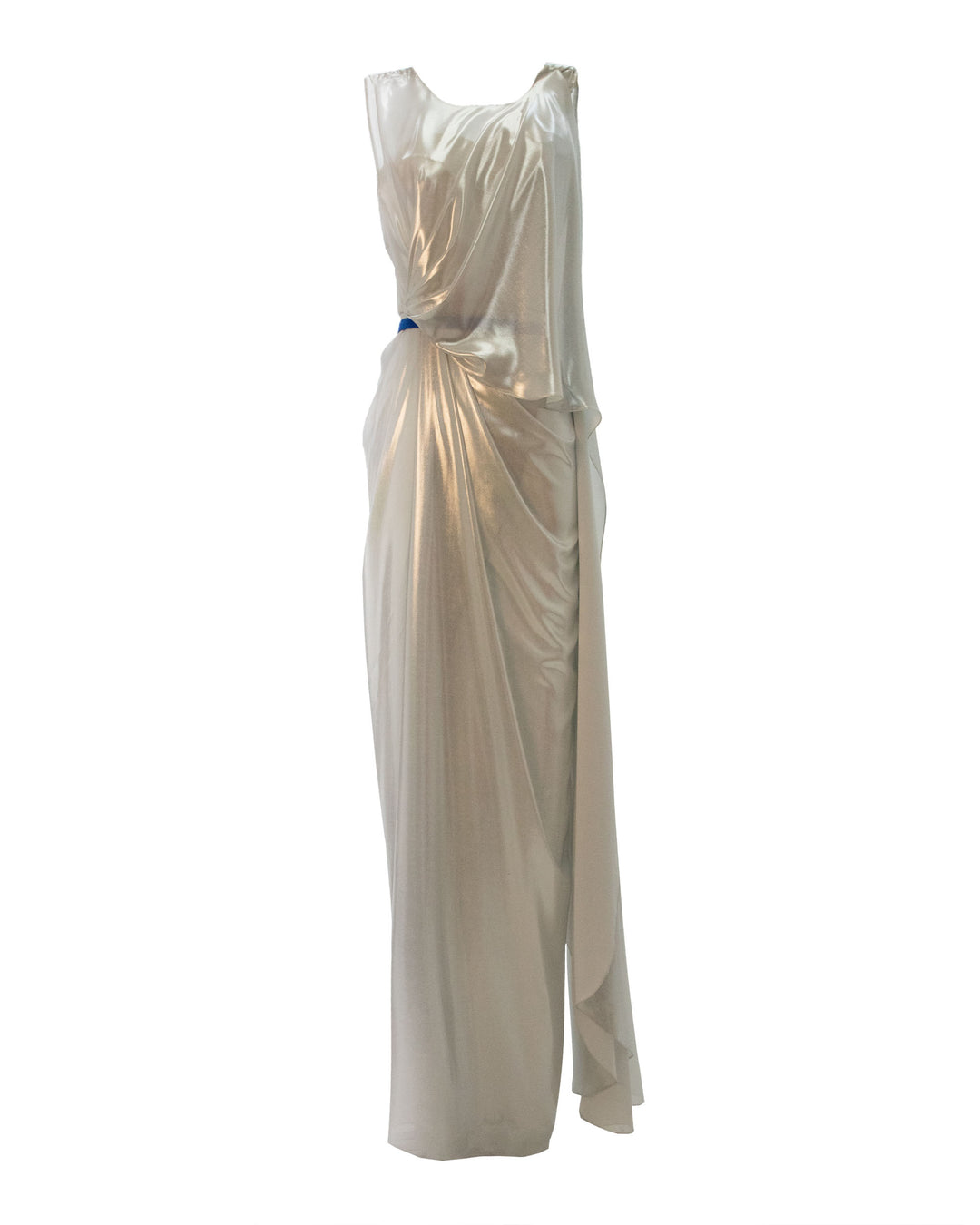 An asymmetrical silver laminated pleated dress featuring an open slit on the side and a contrasting blue belt..