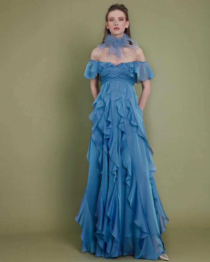 A flared cut off-shoulders blue evening dress featuring fully ruffled details.