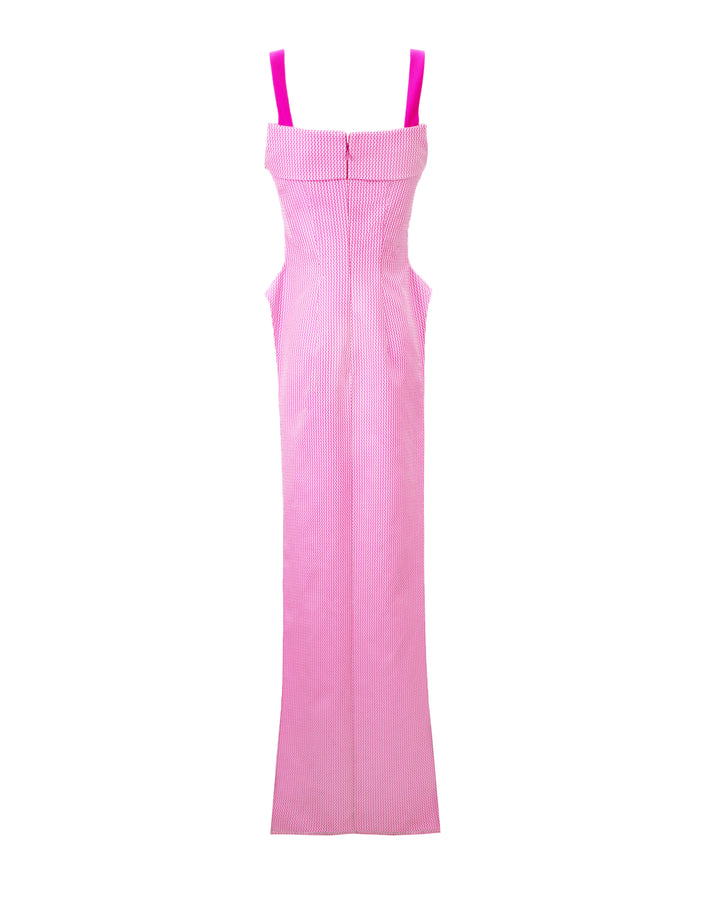 A floor length back of an asymmetrical two tone pink top with a detachable belt.