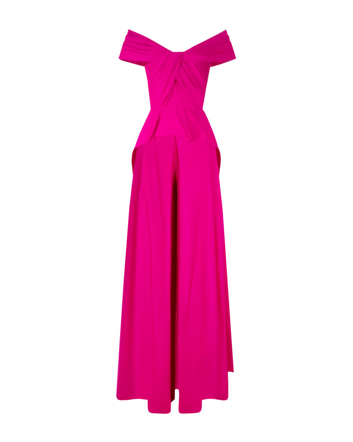 An evening wear fuchsia set featuring an off-shoulder draped taffeta top with back tail detail, paired with wide-leg taffeta pants and a detachable belt.